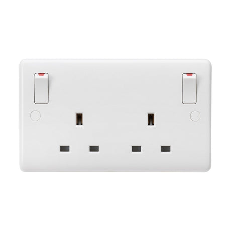 Introducing the 13A 2 Gang DP Switched Socket With Twin Earths And Outboard Rockers (Rounded Edge): a minimalist and hygienic white double electrical wall socket constructed from thermoset resin. It features two switches placed above each set of three-pin plug holes, complete with small red indicators for status display and enhanced anti-microbial properties.