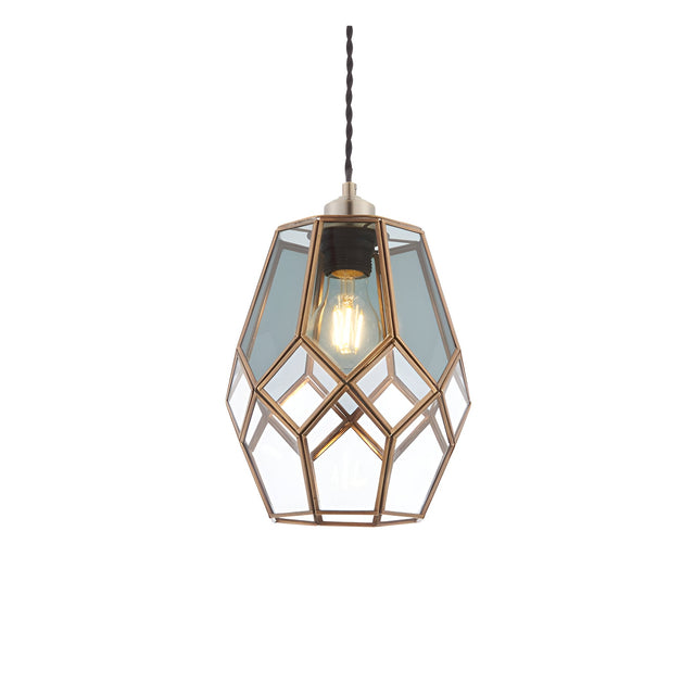 Endon Chartwick pendant shade with clear and smoked grey glass panels set in an antique brass cage frame, lit by an exposed filament bulb.