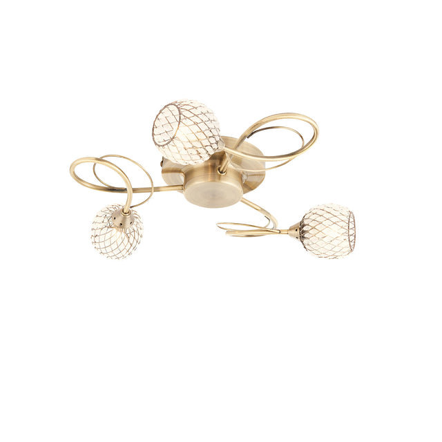 Endon Harcourt 3 light semi-flush ceiling light in antique brass with swirled arms and mesh-effect glass shades on a plain white background.