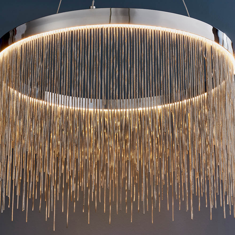 Danestead Pendant in polished chrome, showing a circular LED ring behind cascading fine chains that catch and reflect the light.