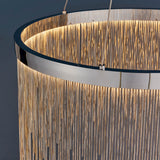 Danestead Pendant in polished chrome, close-up of the circular LED ring behind cascading fine chains that catch and scatter the light.