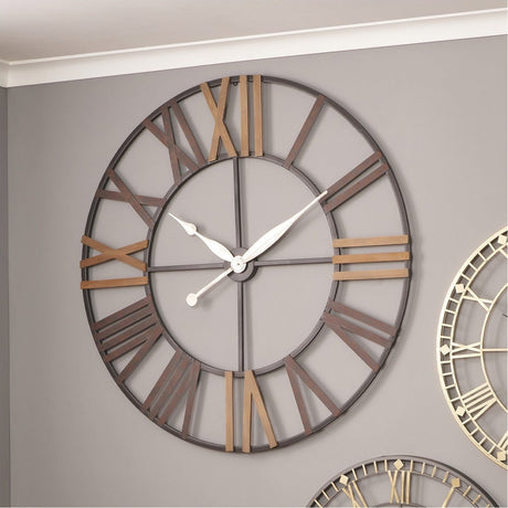 Antique Grey Iron Round Large Wall Clock, 120cm, with open skeleton frame and Roman numerals in wood-tone and grey finish, shown mounted on a grey wall.