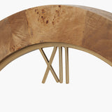 Close-up of the Newborough 80cm round wall clock, showing burr wood effect grain and gold-tone metal Roman numeral XII marker against a plain white background.