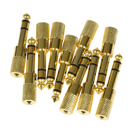 Group of QTX 6.3mm stereo jack plug to 3.5mm stereo jack socket adaptors with gold-plated metal bodies and knurled grips, arranged on a white background.