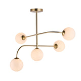 Endon Sinclair 5 light semi-flush ceiling light in brushed brass with five opal glass globes on curved arms, shown on a plain white background.