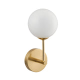Endon Sinclair wall light with a single opal glass globe on a brushed brass stem and round backplate, shown against a plain white background.