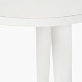 Close-up of the Croft Linen Pine Side Table, 42cm, showing the round white-finished top edge and two tapered cylindrical legs against a plain white background.