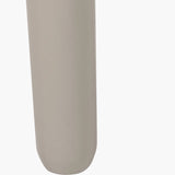 Close-up of the Devonshire Putty Pine Side Table's cylindrical wooden leg with a rounded foot, in a matte putty-beige finish, against a plain white background.
