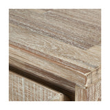 Close-up of the Marca Bar Cabinet's top corner, showing sand wash acacia wood grain with a whitewashed finish and mitred edge detailing.