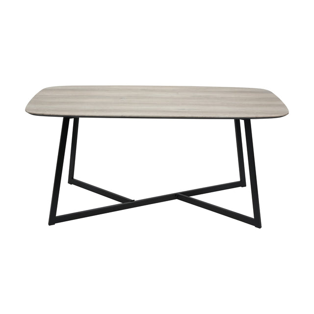 Ukiah Grey Oak Veneer & Black Iron Dining Table with rounded rectangular top and crossed metal legs, shown on a plain white background.