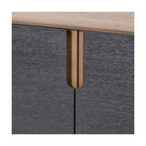 Close-up of the Gio Black & Acacia 4 Door Sideboard, showing a black woodgrain door front with a curved acacia wood handle set against a natural wood top.