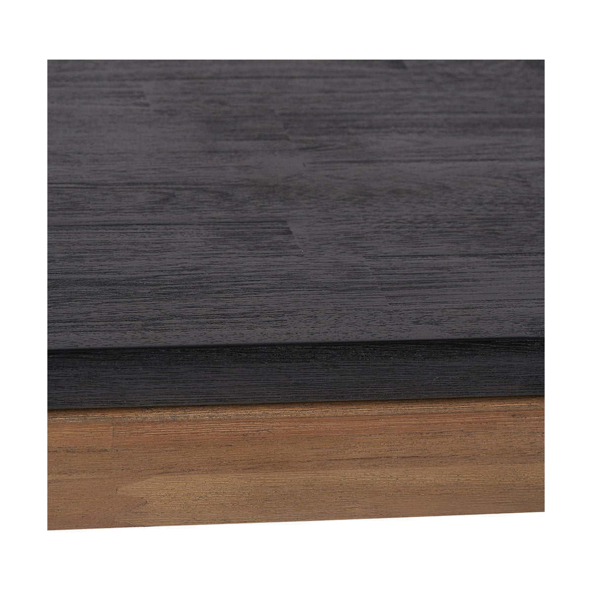 Close-up of the Gio Black & Acacia Dining Table's edge, showing a black wood-grain tabletop set above a natural acacia wood frame.