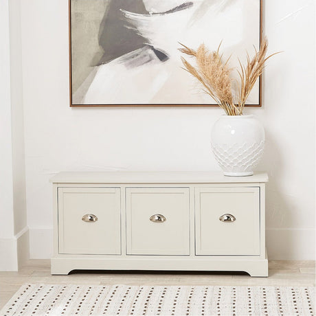 Croft Linen Pine 3 Drawer Unit with cup handles in a hallway, styled with a textured white vase beneath a framed abstract print.