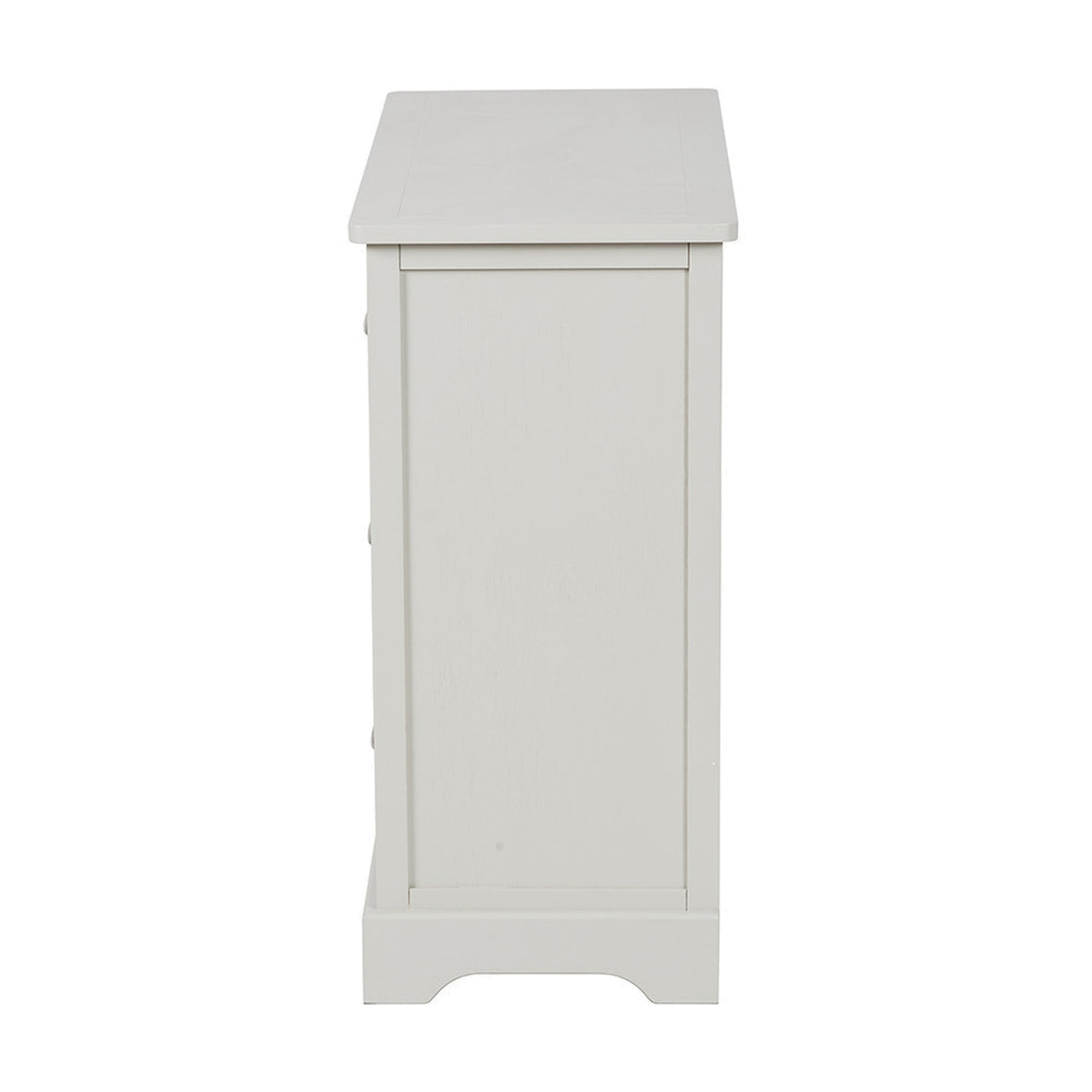 Side view of the Croft Linen Pine 6 Drawer Unit, a wooden chest of drawers with a panelled side, plinth base and pale painted finish, shown on a plain white background.