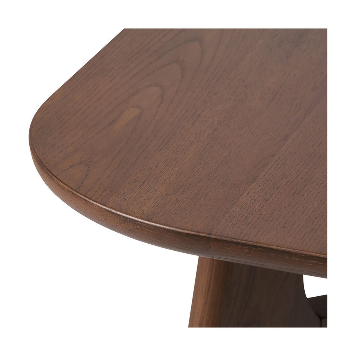 Close-up of the Elias Dark Ash Wood Retro Dining Table, showing the rounded tabletop edge, visible wood grain, and tapered leg on a white background.