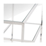 Close-up of the Aleandra Console Table's clear glass top and silver metal frame, showing chrome corner joint detail against a plain white background.