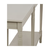 Close-up of the Heritage Putty Pine Large Console Table showing turned wood legs, a lower shelf, and a cream painted finish against a plain background.