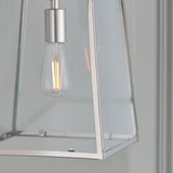 Close-up of the Brenton Lantern Pendant in nickel, a tapered box-frame light with clear glass panels and an exposed E27 filament bulb.