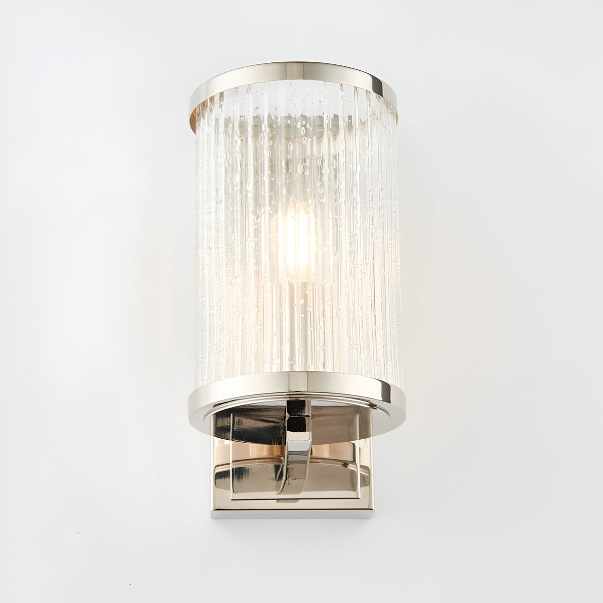 Endon Winslow wall light with clear ribbed bubbled glass shade and nickel-plated square arm and rectangular backplate, on a plain background.