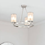 Endon Winslow 3 light semi-flush ceiling light in nickel with textured glass cylinder shades on a circular ring frame, mounted to a white ceiling.