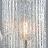 Close-up of the Endon Winslow semi-flush ceiling light showing textured clear glass with raindrop detailing and an illuminated E14 lamp within.