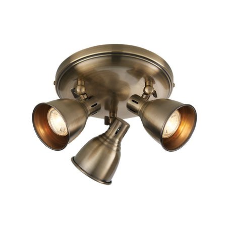 Endon Daneford 3 light round spotlight in antique brass, with three adjustable steel heads on a circular ceiling plate, on a white background.
