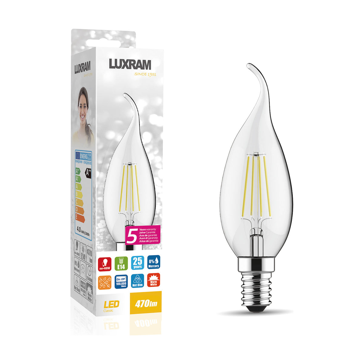 E14 bent-tip candle LED bulb with clear glass, visible filaments and chrome screw cap, shown beside its Luxram packaging on a white background.
