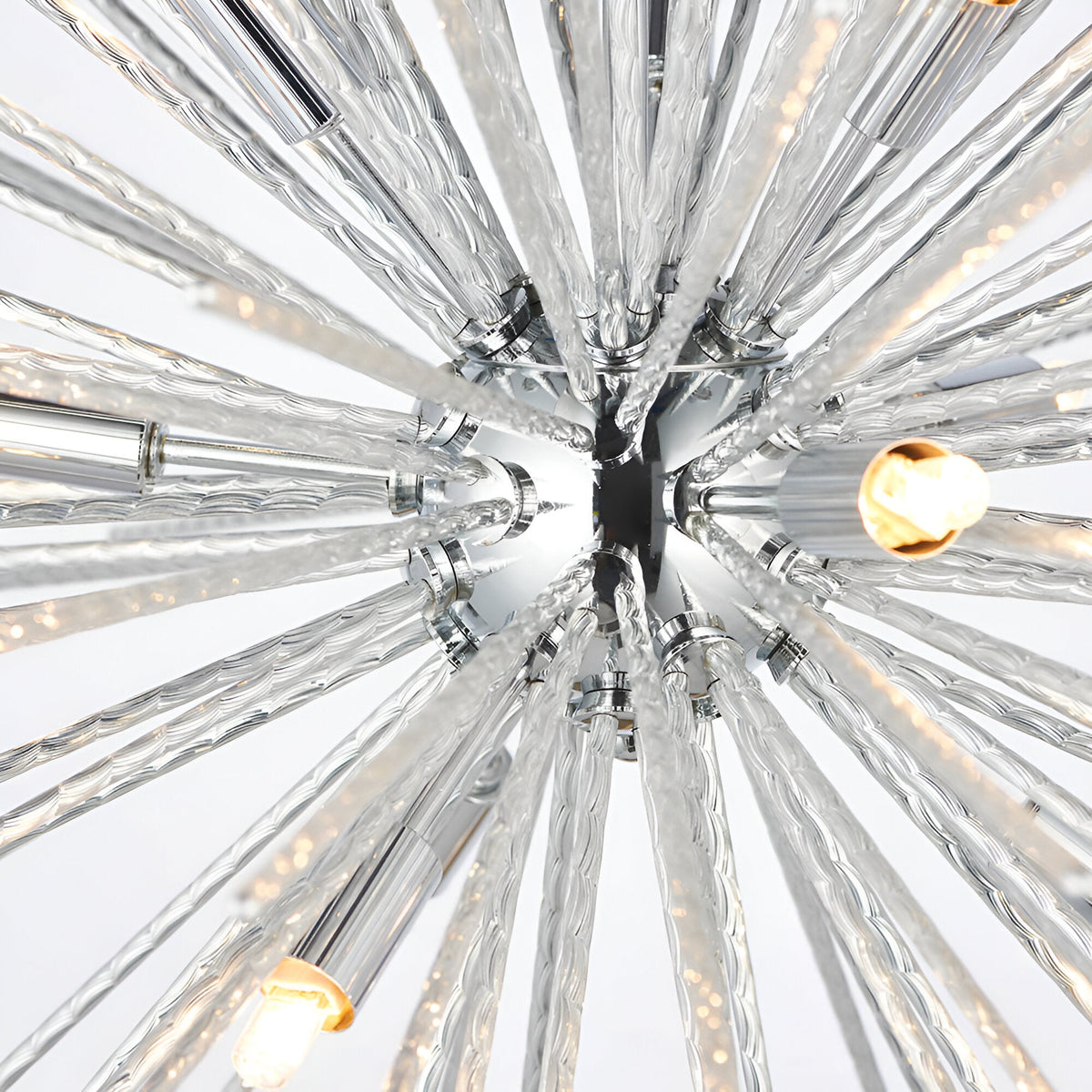Close-up of Endon Caldleigh 9 light pendant showing textured polished chrome rods radiating from a central sphere with G9 lamps at the tips.