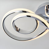 Close-up of the Endon Neve semi-flush ceiling light showing interlocking polished chrome loops with integrated warm white LED strips.