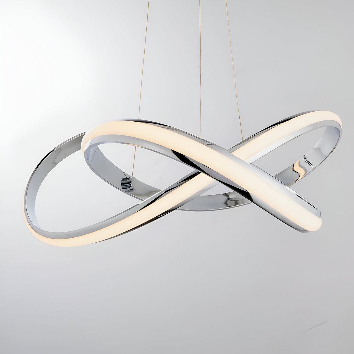 Endon Neve pendant light with sculptural looped chrome band and white LED diffuser, suspended on thin wire cables against a plain light background.