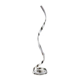 Neve Floor Lamp in polished chrome with a sculptural spiralling curved body on a round base, set against a plain white background.