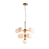Endon Fitzroy 11 light pendant in brushed brass with tiered arms and gloss opal white glass globe shades, shown on a plain white background.