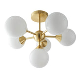 Fitzroy 6 Light Semi-Flush Ceiling Light in gold, brass sputnik-style fitting with six angled arms holding opal glass globe shades, on a plain white background.