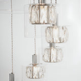 Marguerite 12-light pendant in polished chrome with cascading clear crystal shades at varying heights on adjustable cables.