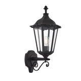 Endon Ashshaw traditional outdoor wall lantern in matt black die-cast aluminium with clear glass panels, scrollwork bracket and E27 filament bulb.