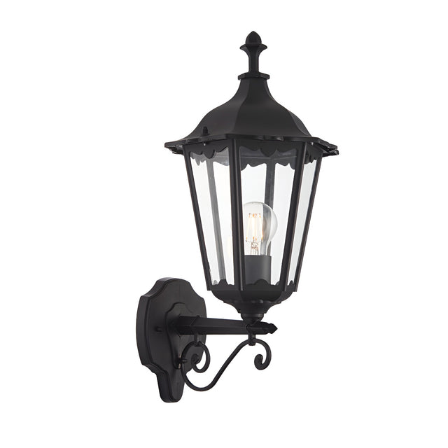 Endon Ashshaw traditional outdoor wall lantern in matt black die-cast aluminium with clear glass panels, scrollwork bracket and E27 filament bulb.