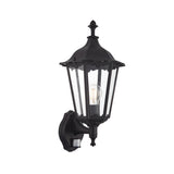 Endon Ashshaw traditional outdoor wall lantern in matt black die-cast aluminium with clear glass panels, E27 filament bulb and PIR sensor at the base.