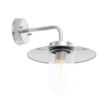Endon Aldbury outdoor wall light in polished stainless steel with a clear glass shade, disc canopy and E27 filament bulb, on a white background.
