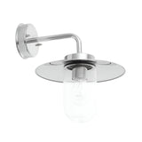 Endon Aldbury outdoor wall light in polished stainless steel with a clear glass shade, circular disc reflector and E27 filament bulb, on a white background.