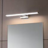 Endon Aldshaw LED bathroom wall light in chrome, a slim illuminated bar with frosted diffuser mounted above a rectangular mirror on a tiled wall.
