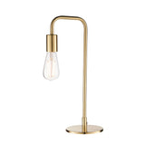 Endon Cliffgrove table lamp in brushed brass with a slim angled arm, round base, toggle switch and exposed E27 filament bulb, on a white background.