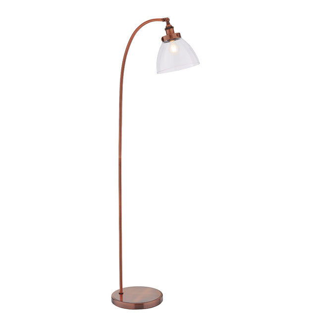 Endon Wentworth floor lamp in copper with an arched stem, adjustable knuckle, clear glass dome shade and E27 bulb, on a round base against a white background.