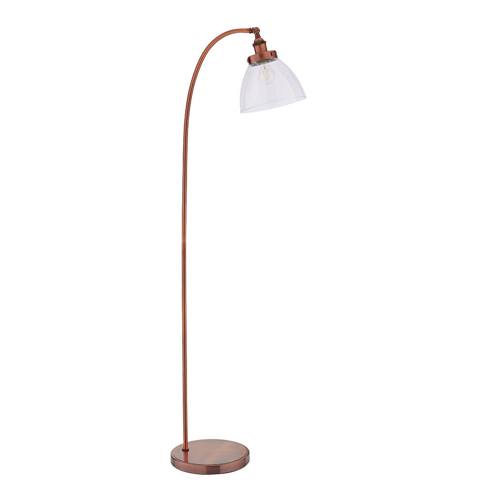 Endon Wentworth floor lamp in copper with an arched stem, clear glass dome shade, knurled lamp holder, and round base on a plain white background.