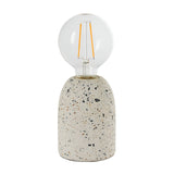 Endon Crangrove small white terrazzo table lamp with speckled composite base and exposed E27 filament globe bulb, shown on a plain white background.