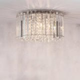 Brenbourne Flush Ceiling Light in polished chrome, featuring vertical rows of clear K5 crystal and faceted glass droplets, mounted close to a plain ceiling.