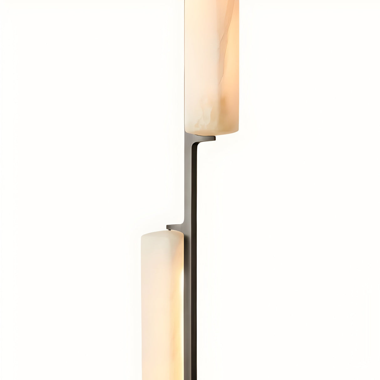 The Selvara LED Vertical Duo Alabaster Single Pendant Light features two softly glowing Spanish alabaster glass shades arranged vertically on a matte black support, adding modern elegance against a plain white background.