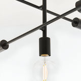 Close-up of Endon Marlowe 5 Light Semi-Flush Ceiling Light in black, showing a matte metal arm, cylindrical lamp holder, and exposed E27 filament bulb.