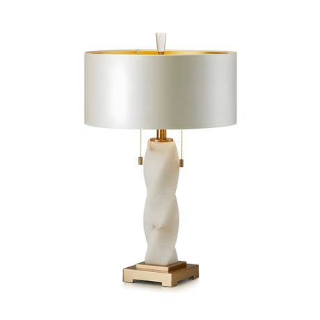 The Eryndel 1 Light Sculpted Alabaster Table Lamp features a brass finish, soft white twisted alabaster base, gold accents, rectangular gold platform, and a large cylindrical white lampshade with gold lining and two pull chains.