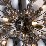 Close-up of the Endon Brenworth 8 Light Pendant showing its black chrome sputnik frame with electro-plated dark chrome glass globe shades and lit G9 lamps.