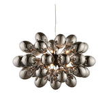 Endon Brenworth 8 light pendant in black chrome with clustered dark chrome glass globe shades on clear flex against a white background.